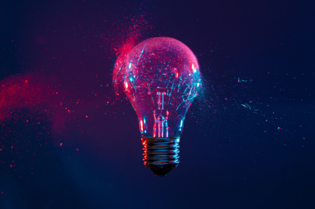pink blue shattered light bulb artifical intelligence consulting