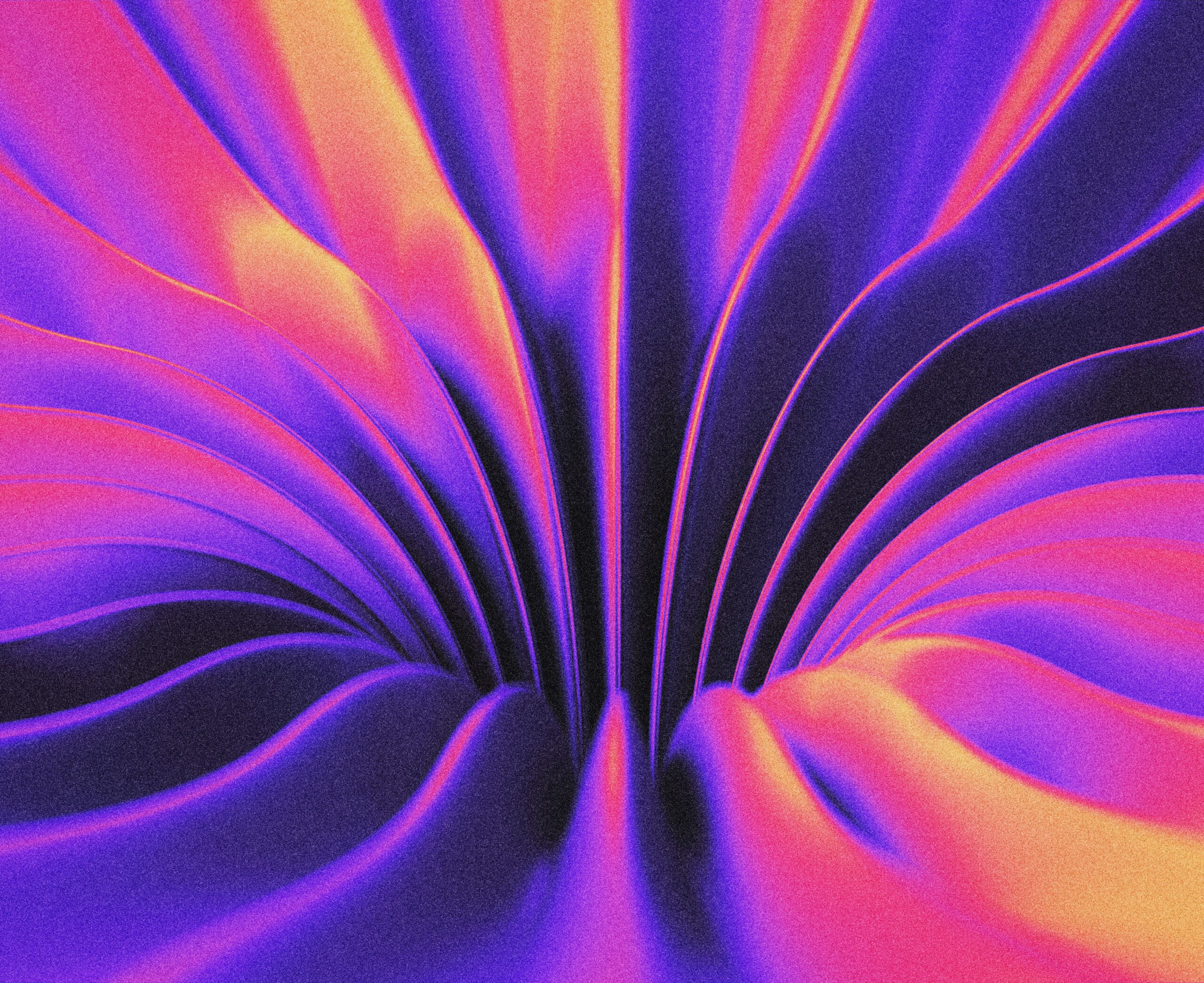 man smiling in blue pink light