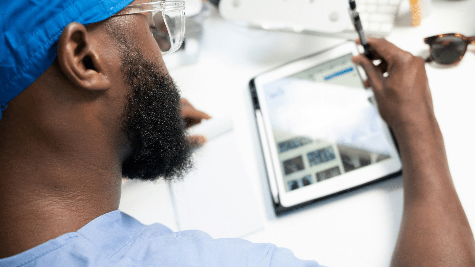 doctor looking at gen ai report on ipad